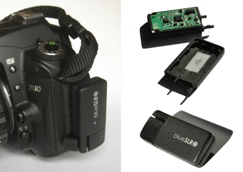 blueSLR prototype mounted on a Nikon DSLR beside its opened housing and circuit board