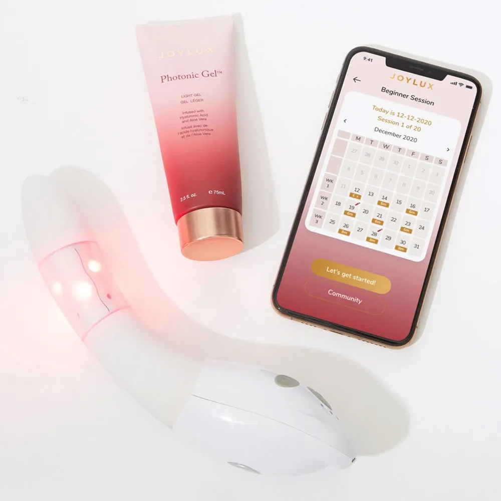 vSculpt device lit red beside Joylux Photonic Gel and the session app on a phone