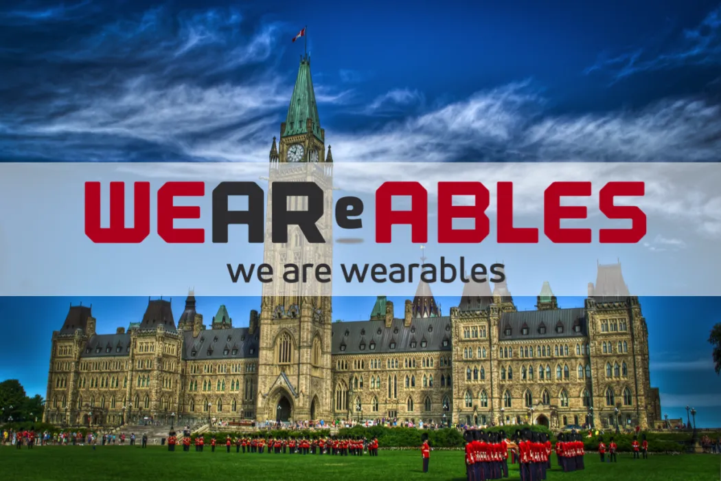 We Are Wearables logo over Parliament Hill in Ottawa during the Changing of the Guard