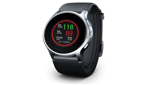 Omron HeartGuide wristwatch blood pressure monitor showing systolic, diastolic and pulse readings
