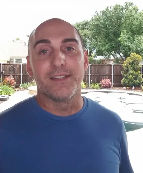 John, founder of Lily Chillers, in his backyard beside his swimming pool