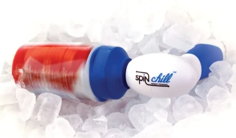 SpinChill beer chiller spinning a red can in a bed of ice