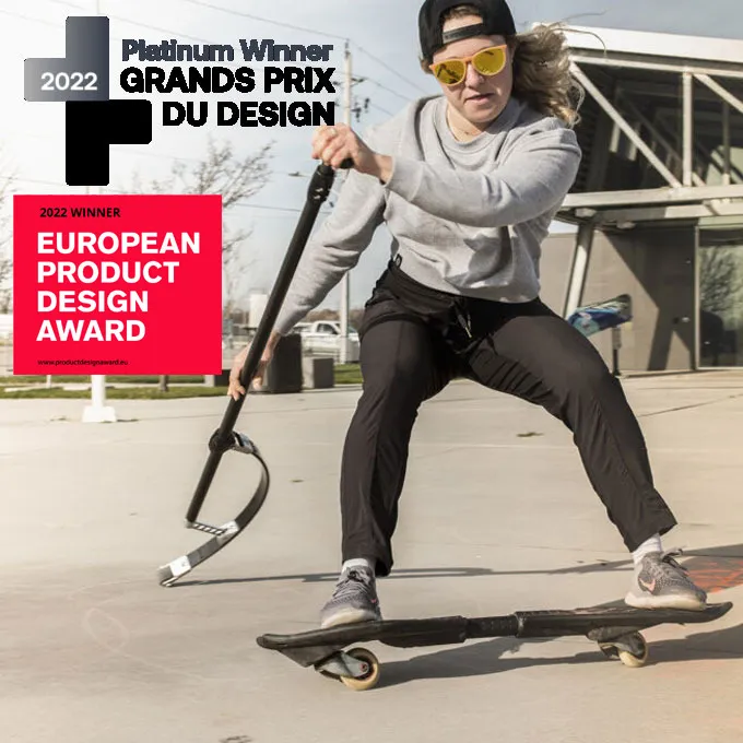 SUPStick land paddle rider on a skateboard with 2022 Grands Prix du Design and European Product Design Award badges