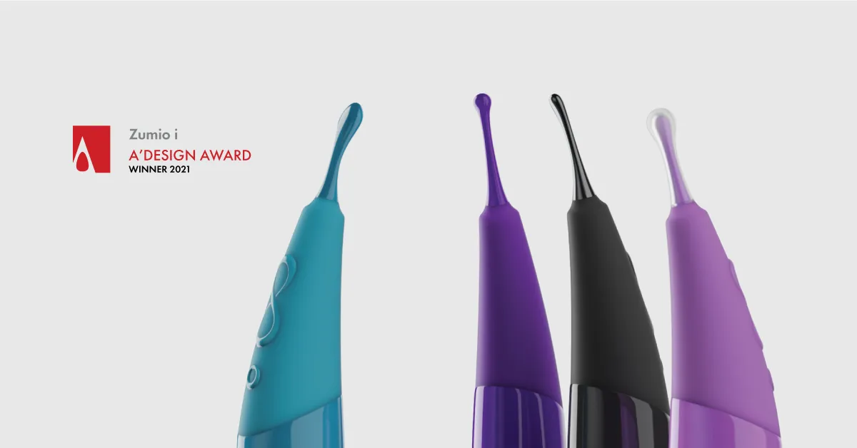 Four Zumio i stimulators in teal, purple, black and lilac with the A’ Design Award 2021 winner badge