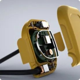 Cutaway render of a yellow handheld device exposing its circuit board