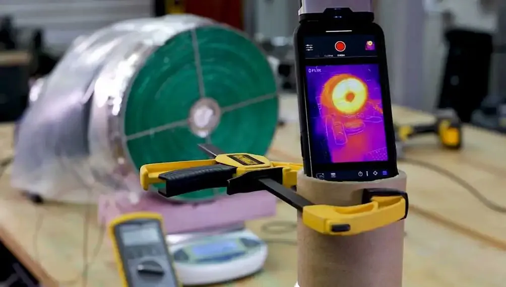 Thermal imaging phone clamped in place to measure heat from the Molecule desiccant rotor