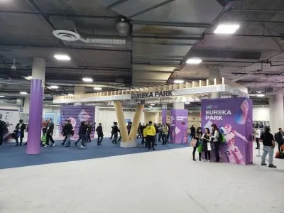 Eureka Park startup area entrance at CES 2020 with purple signage and attendees
