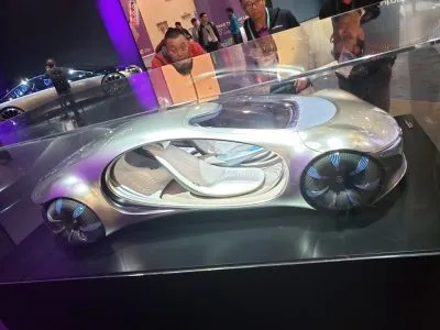 Silver futuristic concept car with illuminated spherical wheels on display at CES 2020